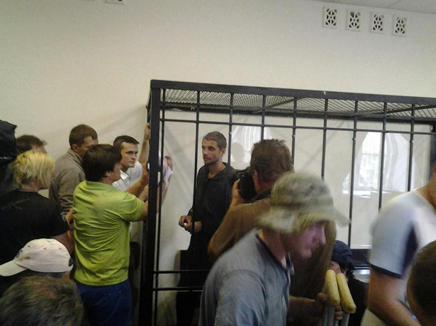 У Києві триває перший суд над підозрюваними у вбивстві Бузини - фото 6