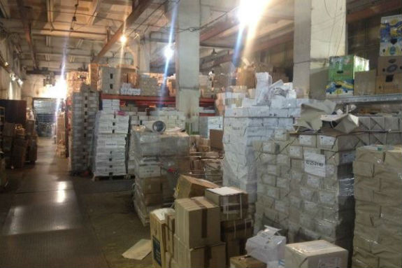 У Києві виявили підпільну типографію: вилучено 400 тонн книг  - фото 4