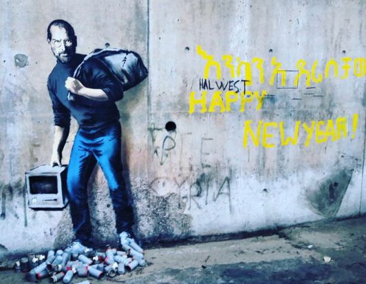 З’явилося графіті Стіва Джобса в образі сирійського біженценця - фото 1