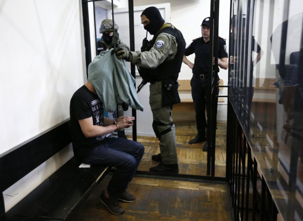 У Києві триває перший суд над підозрюваними у вбивстві Бузини - фото 8