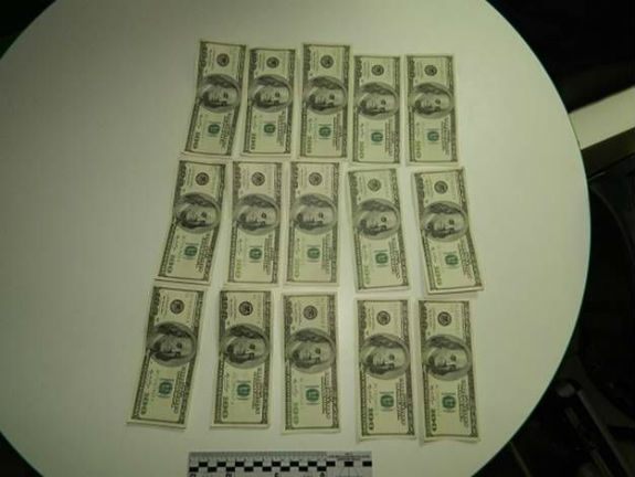 Молодик приніс у столичний банк 1,5 тисячі фальшивих доларів - фото 2