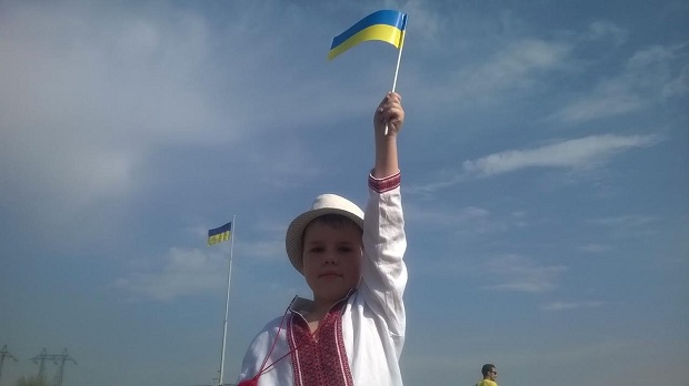 День Державного Прапора у Запоріжжі розпочали з урочистого підняття державного знамена над славетним островом - фото 7
