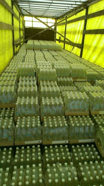 СБУ затримала десятки тисяч пляшок "паленої" горілки, які везли терористам - фото 3