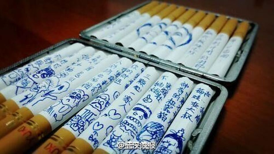 Китаянка розмалювала цигарки мультяшками, аби її чоловік кинув палити - фото 1