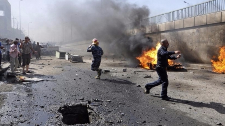 Смертники підірвали "швидкі" в іракських містах, 21 загиблий - фото 1
