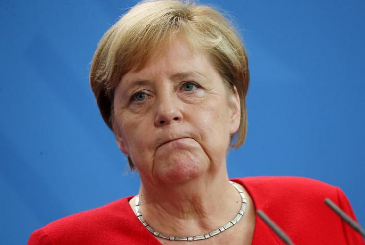 Меркель поговорила з Путіним щодо емігра…