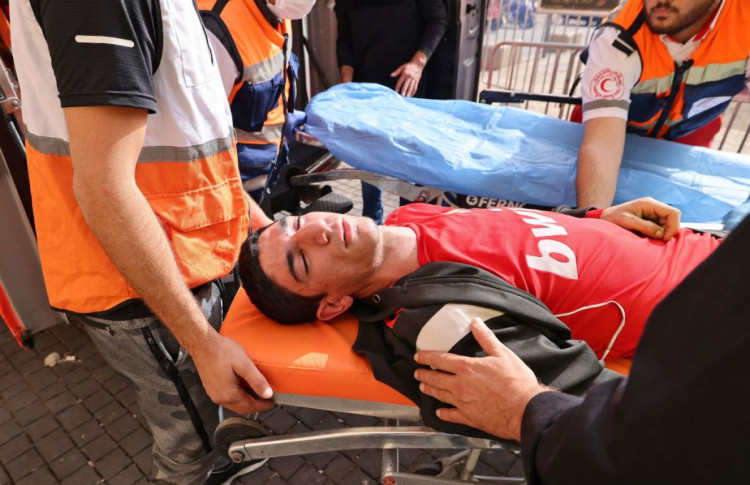 ранен палестинский протестующий